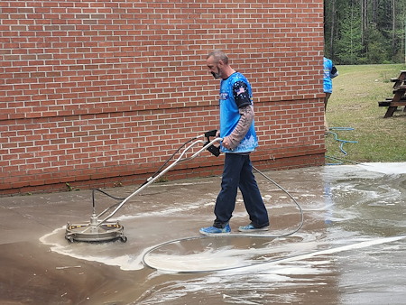 Slippery, Stained, or Cracked? 7 Signs Your Concrete Needs Professional Cleaning